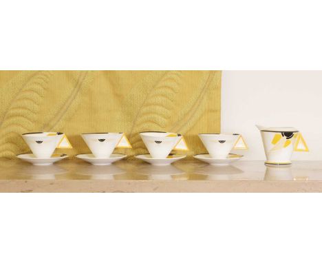 Shelley 'Vogue Sunray' items,designed by Eric Slater, comprising: 6 coffee cups,7 saucers,6 tea cups, anda milk jug,all with 