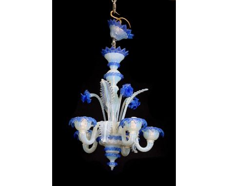 A Murano glass hanging ceiling light, with five branches, beneath a tier of flowers and leaves, 48cm diameter74cm highConditi