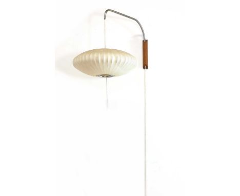 A George Nelson 'Saucer' wall light,designed in 1952 for Herman Miller, with original shade and wall mount, labelled 'Bubble 