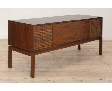 § A Bang &amp; Olufsen 'RG1200' and '1500' rosewood music cabinet,centred with a hinged cover, enclosing a reel to reel, turn