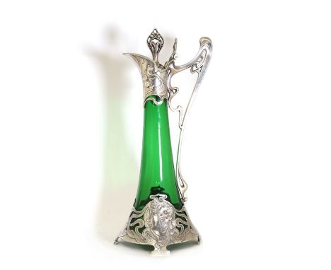 An Art Nouveau WMF claret jug and stopper,of slender tapering form, silver-plated and green glass, with a handle and mounts c