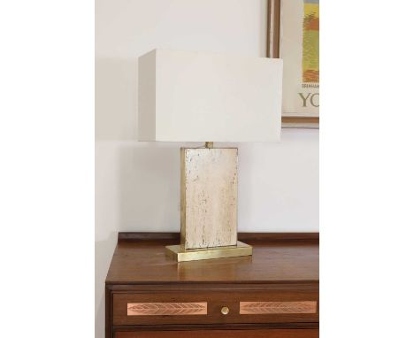 A travertine and brass table lamp, 1970s, 40cm wide 59.5cm highCondition ReportBase slightly loose. Shade knocked.