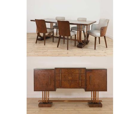 An Art Deco burr walnut dining suite,comprising:a dining table, the rectangular top with rounded corners, raised on metal cop