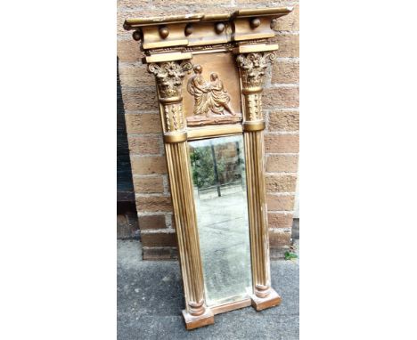 A GILT FRAMED PIER MIRROR  with Corithian column pilasters, 