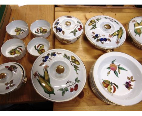 A COLLECTION OF ROYAL WORCESTER 'EVESHAM' PATTERN DINNERWARE  comprising lidded tureens, plates, bowls, cups etc.