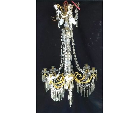 A LARGE CONTINENTAL GILT METAL AND GLASS CEILING LIGHT FITTING fitted with four electric lights and candle sconces issuing fr