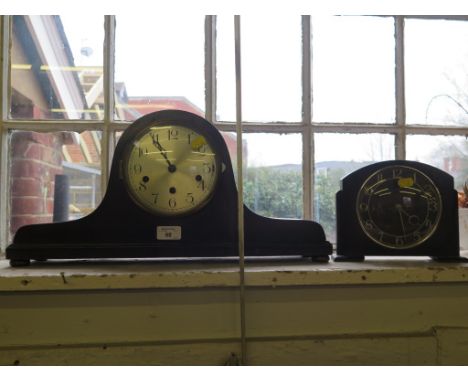 An admiral hat mantel clock with silvered dial, 51cms wide and another mantel clock 
