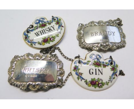 Two silver wine labels, brandy and whiskey, Birmingham 1981 and 1992, together with two Crown Staffordshire whiskey and gin l