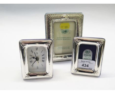 An Italian silver bedside clock with matching small photo frame, marked 925 and another