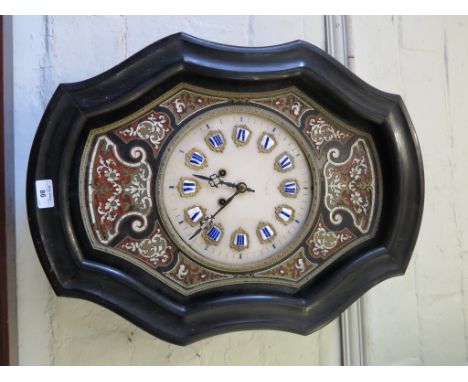 A 19th century French ebonised and boullework wall clock, the shaped case enclosing an alabaster dial with enamel chapters, t