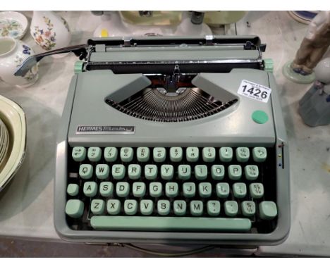 Cased Hermes Baby typewriter. Not available for in-house P&amp;P 