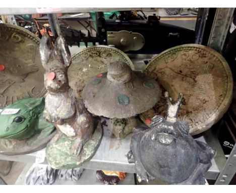Shelf of mixed garden ornaments. Not available for in-house P&amp;P 