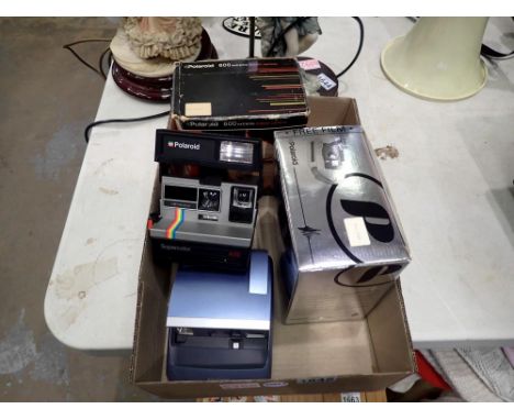 Four Polaroid instant cameras, two boxed. Not available for in-house P&amp;P