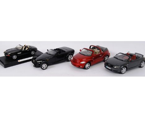 1:18; a collection of 3x 1:18 scale unboxed diecast model cars - Motormax, Maisto and 1x 1:24 BMW model