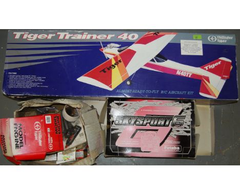 TIGER RC PLANE: An entire unused RC plane model kit. Comprising of; a Tiger Trainer 40 ' Almost Ready To Fly ' RC plane kit, 