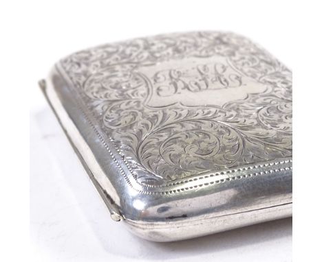 An Edwardian silver rectangular curved cigarette case, all-over engraved foliate decoration with gilt interior, by William Ai