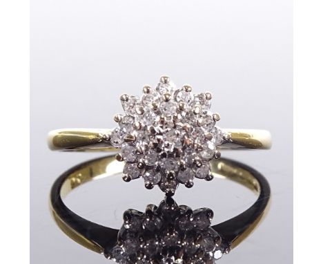 An 18ct gold diamond cluster snowflake dress ring, total diamond content approx 0.2ct, setting height 9mm, size N, 3.7gVery g