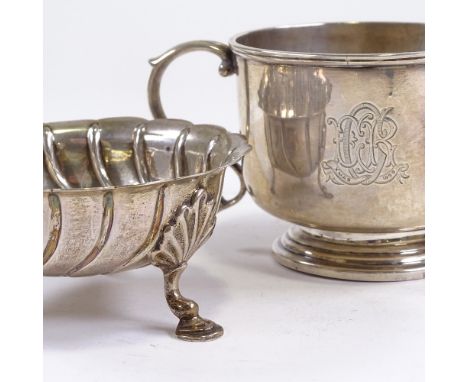 A late Victorian silver 2-handled pedestal porringer by George Nathan & Ridley Hayes, hallmarks Chester 1897, and a circular 