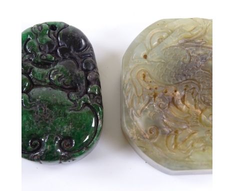 A Chinese relief carved spinach jade pendant, length 5cm, and another carved jade pendant (2) 