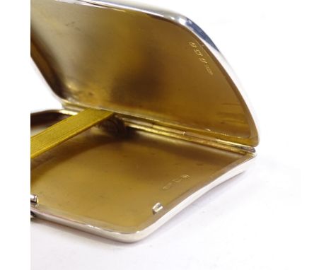 A George V curved silver cigarette case, plain form with gilt interior, by A & J Zimmerman, hallmarks Birmingham 1912, length