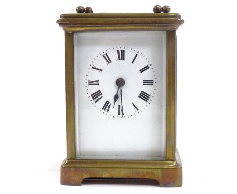 A French brass-cased carriage clock in leather travelling case, height 11cm 
