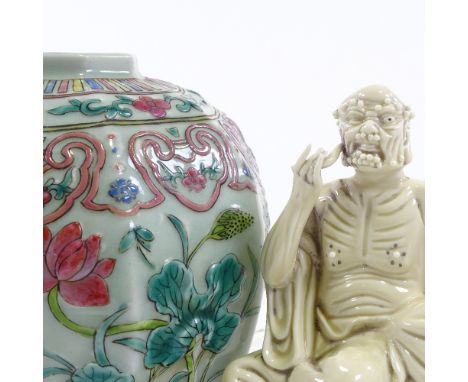 A Chinese porcelain jar with moulded and painted decoration, height 17cm, and a Chinese white glaze porcelain Sage figure, he