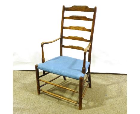 An 18th/19th century elm ladder-back elbow chair 