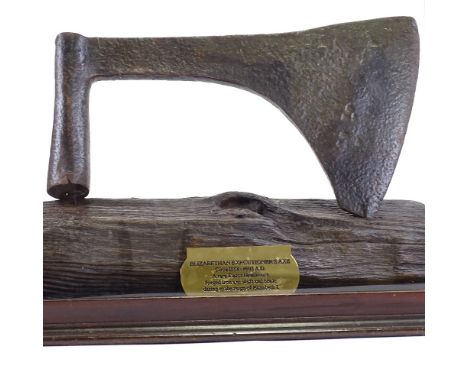 An Elizabeth I executioner's axe head, circa 1558 - 1603, forged iron, cutting edge length 20cm, head length 33cm, mounted on