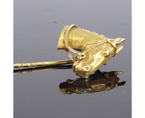 A 14ct gold figural horsehead racing stick pin, realistically formed, overall length 65.1mm, 5.6gVery good original condition