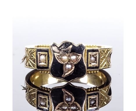 A 9ct gold pearl, black enamel and hair mourning ring, with inset woven hair shank and central leaf shield panel, panel heigh