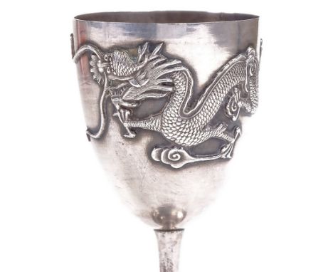 A small Chinese silver goblet, with dragon decoration, height 9cmHallmarks under base rim are clear. Light surface scratches.