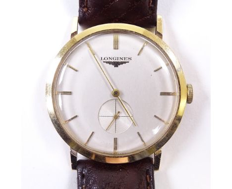 LONGINES - a Vintage 9ct gold mechanical wristwatch, ref. 3146, circa 1950s, silvered dial with applied gilt baton hour marke
