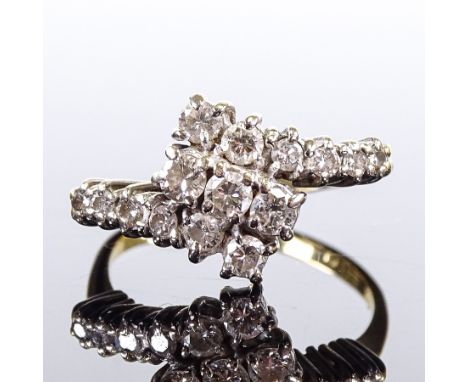 An 18ct gold diamond cluster crossover dress ring, total diamond content approx 0.5ct, setting height 12.5mm, size R, 4.7gVer