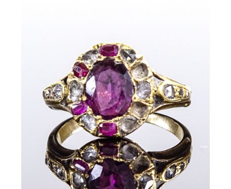 A 19th century unmarked gold ruby and rose-cut diamond cluster ring, 11.6mm, size J, 31.g (2 rubies missing)Good overall cond