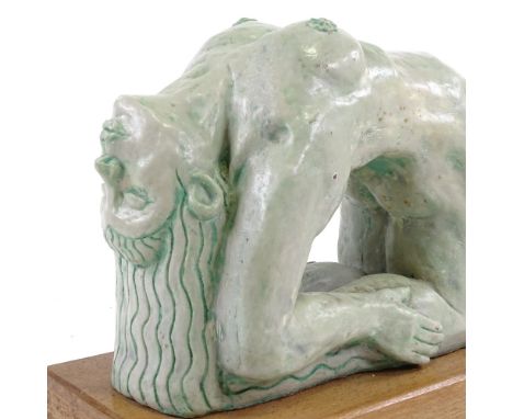 A modern British green glazed ceramic nude female sculpture, unsigned, on oak plinth, plinth length 35cm 