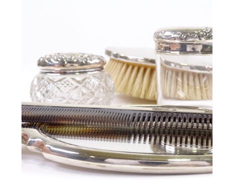 Various silver dressing table items, including hand mirror, brush, powder jar, etc, (5)All in good overall condition, no obvi