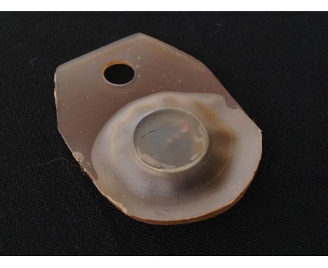 WW2 British RAF Escape Compass in rubber pouch. Could be worn around the neck and swallowed in the event of capture.
