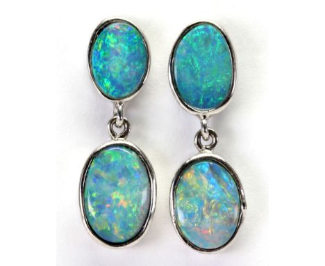 Pair of opal doublet, sterling silver earrings
Featuring (4) oval opal doublets, ranging in size from 9 X 7 mm to 7 X 6 mm, s