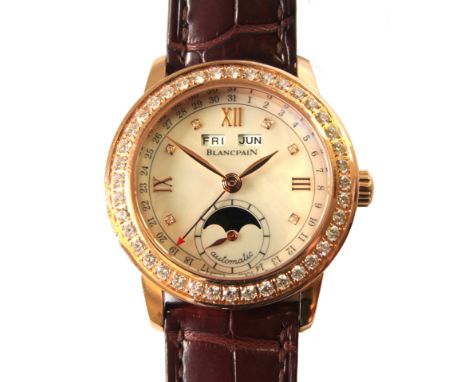 Blancpain diamond, 18k rose gold Leman calendar/moonphase wristwatch
REF: 2360

Dial: round, mother-of-pearl, applied diamond
