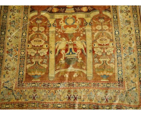 An antique silk Persian carpet, 4'6" x 6'5"