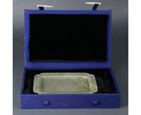 A Fine Chinese Jade Tray, the shallow rectangular shape with canted corners, overall in the semi-translucent stone an even pa