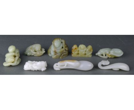 (lot of 8) A group of eight carved Jade figures, in consisting with a white jade belt buckle, together with several figural c