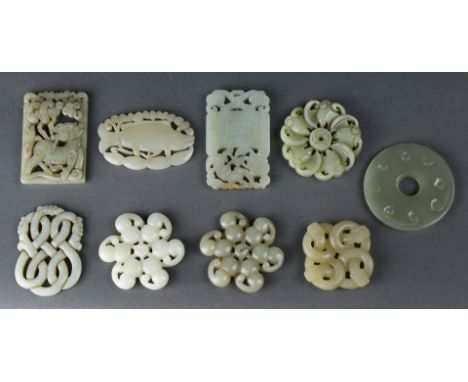 (lot of 9) A group of nine Chinese carved jade pendants, In consisting with one Bi-disc shaped circular jade, one rectangular