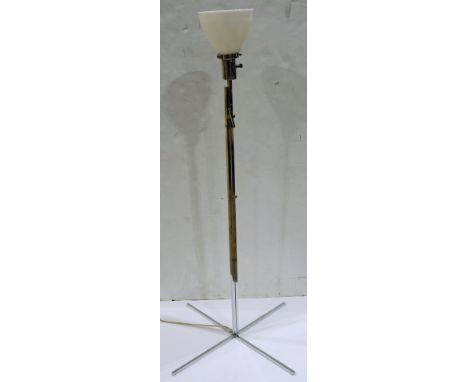 Walter Von Nessen floor lamp, having a chrome adjustable support and rising on a propeller base, 42"h