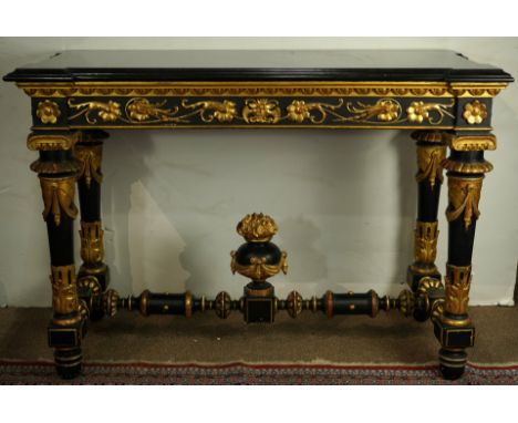 An Italian Renaissance style ebonized and partial gilt console table, having a rectangular top with a floral decorated apron 