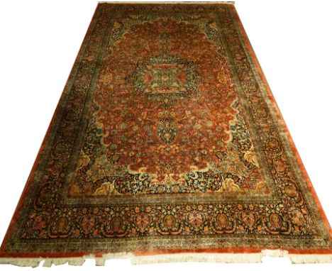 A Kashmiri art silk carpet, 11'5" x 19'6