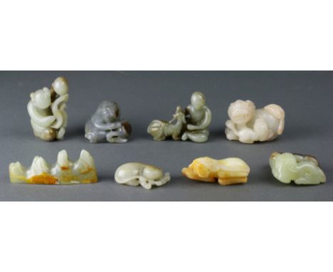 ( lot of 8) A group of Chinese jade and hardstone carvings, in consisting with a seated figure and ram, a recumbent foo-lion,