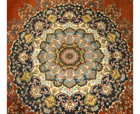 A Pakistani Tabriz carpet, 8'8" x 11'11"