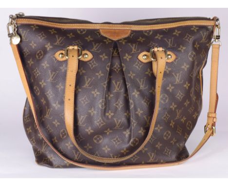 A Louis Vuitton Palermo GM bag is crafted of Monogram canvas with vachetta leather trim, features two adjustable handles and 