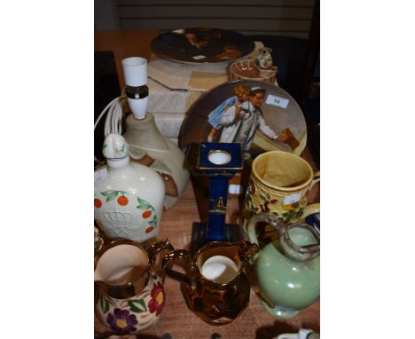 A variety of ceramics including collectors plates, Carleton Ware candle stick, Hand painted tankard, jugs, Troika style lamp 